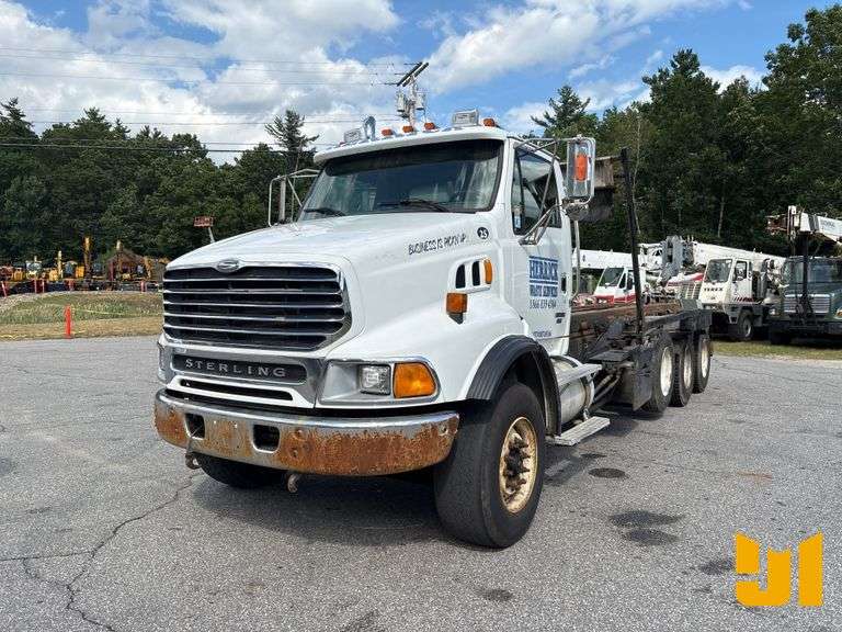 2005 STERLING 8500 TRI ROLL OFF TRUCK