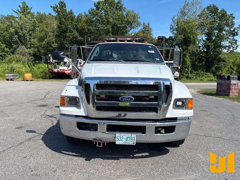 2011 FORD F-650 SINGLE AXLE REGULAR CAB STAKE BED TRUCK VIN: 3FRWF6FC8BV589342
