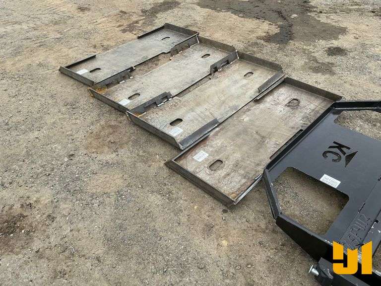UNUSED FORMED SKID STEER FRAME MOUNTING PLATE