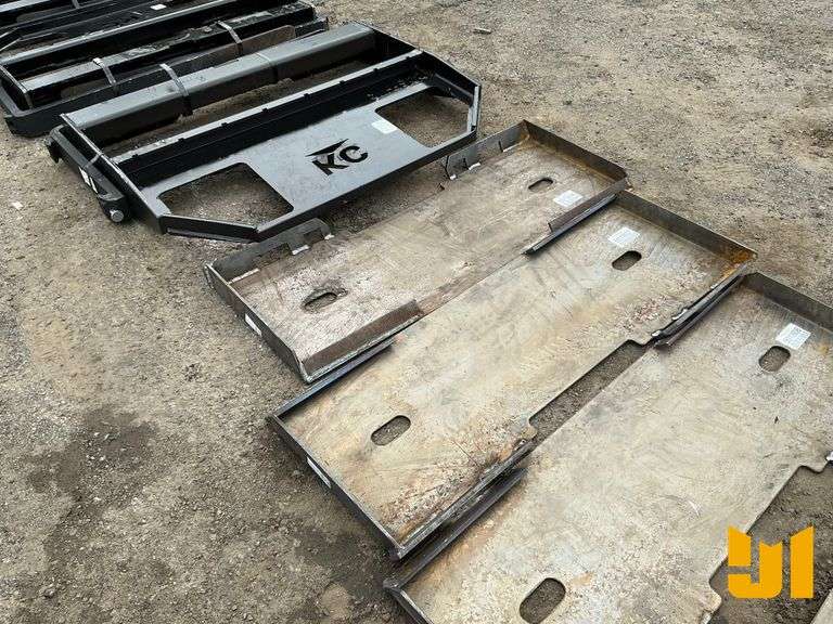 UNUSED FORMED SKID STEER FRAME MOUNTING PLATE