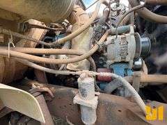 2001 INTERNATIONAL 4700 S/A REAR LOAD RESIDENTIAL COLLECTION TRUCK VIN: 1HTSCAAN51H213578