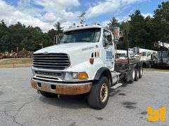 2005 STERLING 8500 TRI ROLL OFF TRUCK