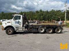 2005 STERLING 8500 TRI ROLL OFF TRUCK