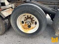 2005 STERLING 8500 TRI ROLL OFF TRUCK