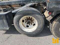 2005 STERLING 8500 TRI ROLL OFF TRUCK