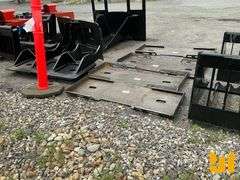 UNUSED FORMED SKID STEER FRAME MOUNTING PLATE