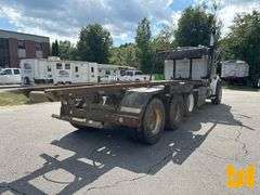 2005 STERLING 8500 TRI ROLL OFF TRUCK