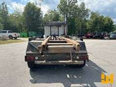 2005 STERLING 8500 TRI ROLL OFF TRUCK