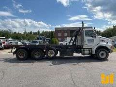 2005 STERLING 8500 TRI ROLL OFF TRUCK