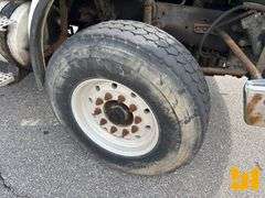 2005 STERLING 8500 TRI ROLL OFF TRUCK