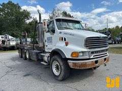 2005 STERLING 8500 TRI ROLL OFF TRUCK