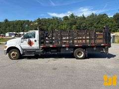 2011 FORD F-650 SINGLE AXLE REGULAR CAB STAKE BED TRUCK VIN: 3FRWF6FC8BV589342