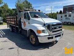 2011 FORD F-650 SINGLE AXLE REGULAR CAB STAKE BED TRUCK VIN: 3FRWF6FC8BV589342