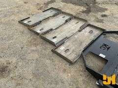 UNUSED FORMED SKID STEER FRAME MOUNTING PLATE