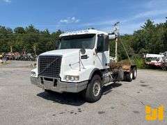 2004 VOLVO TRUCK VHD T/A ROLL OFF TRUCK VIN: 4V5KC9GG94N369391