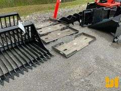 UNUSED FORMED SKID STEER FRAME