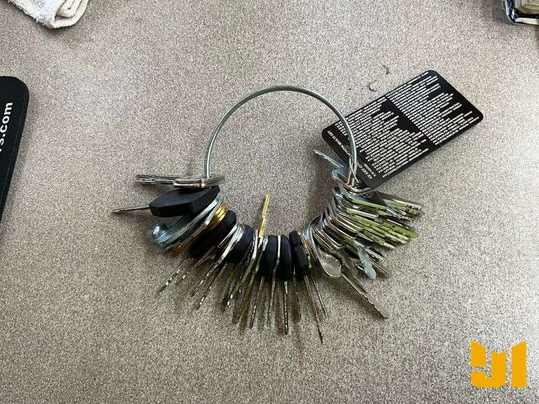 KEY RING WITH VARIOUS KEYS FOR VARIETY OF EQUIPMENT