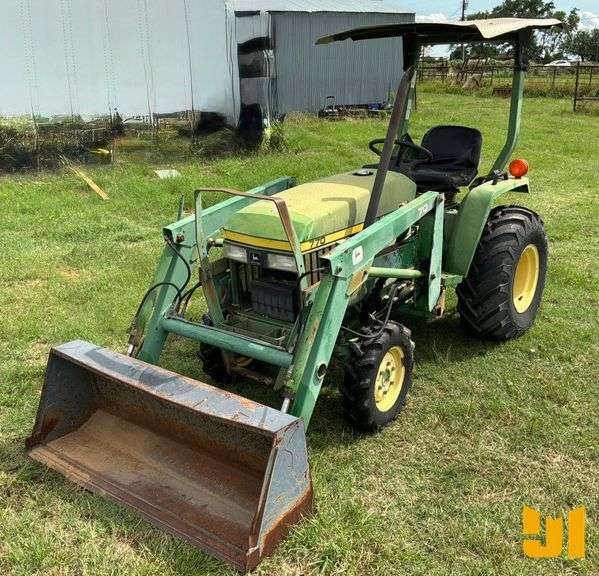 1997 JOHN DEERE 770 SN: M00770A161444 4X4 TRACTOR W/ LOADER