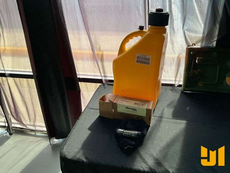 UNUSED FUEL JUG 6 GALLONS, BIKE LOCK COMBINATION