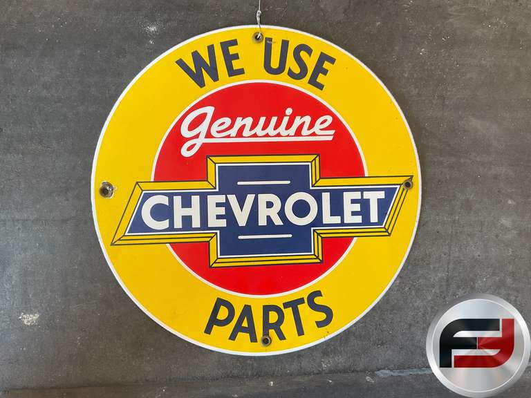 WE USE GENUINE CHEVROLET PARTS ENAMEL SIGN, 12” DIAM.