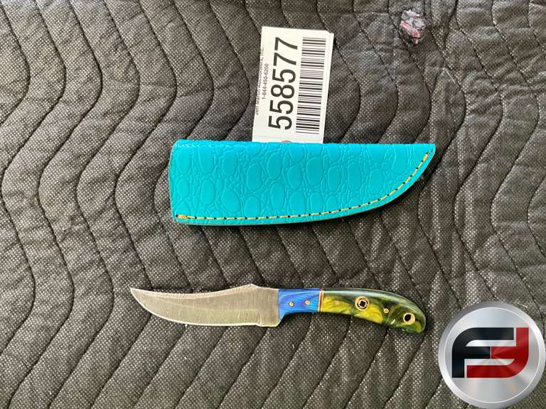 DAMASCUS STEEL KNIFE MEASURING APPROXIMATELY 7 INCHES IN LENGTH, FEATURING