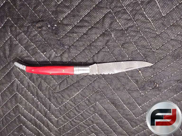 APPROXIMATELY 8 1/2 INCHES LONG, THIS FOLDING KNIFE FEATURES A