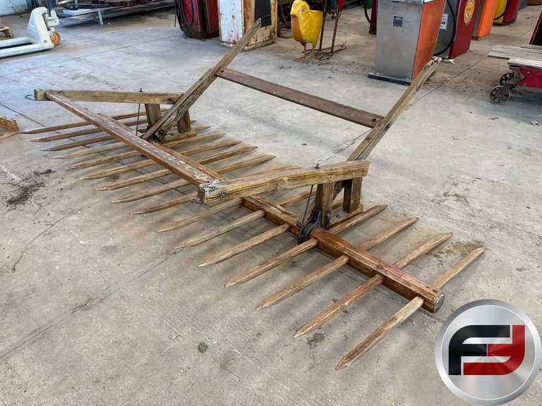 PRIMITIVE REVOLVING HAY RAKE