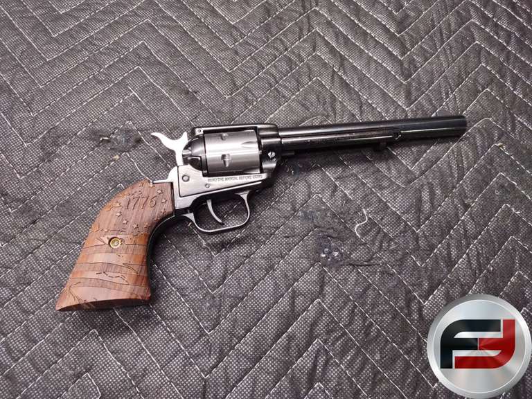 HERITAGE MANUFACTURING MODEL ROUGH RIDER 22 COMBO .22 LONG RIFLE & .22 MAGNUM SN: C98997