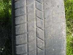 Hankook P205/70R15 tire on 5-hole rim - Johnson Auction