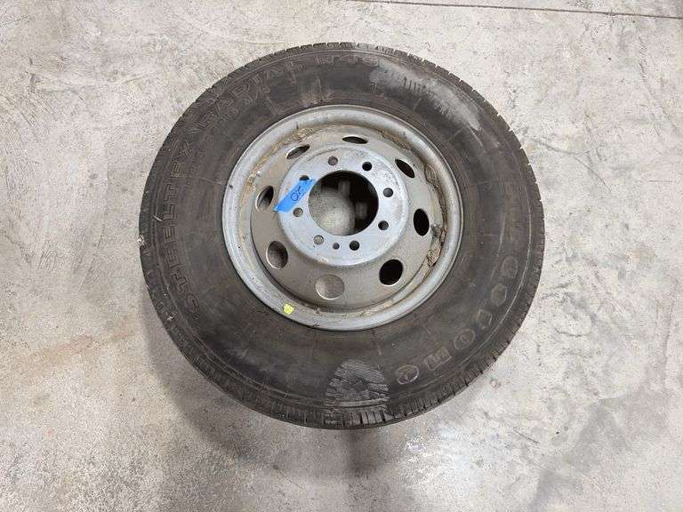 Firestone 215/85R16 Tire on Ford 8-hole Rim