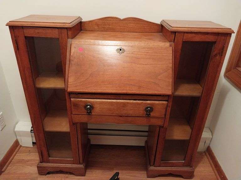 Antique Secretary Desk with a drop front writing surface and 2 side bookcases