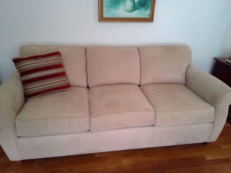 Nice Cream Colored Upholstered Couch