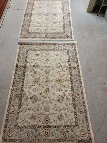 2 smaller area rugs
