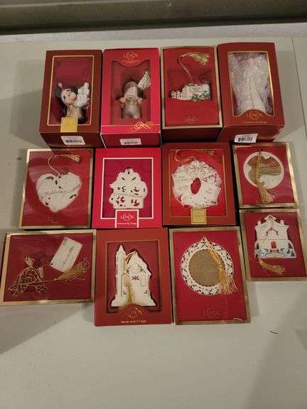 Collection of Lenox Christmas ornaments in the box