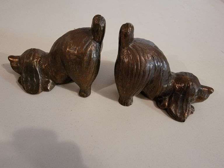 2 dog bookends, and 1 brass dog sculpture