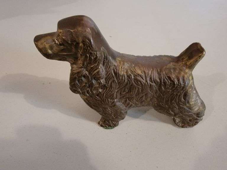 2 dog bookends, and 1 brass dog sculpture
