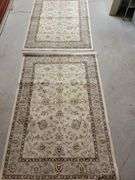 2 smaller area rugs