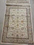 2 smaller area rugs