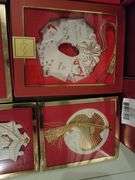 Collection of Lenox Christmas ornaments in the box