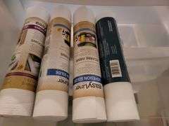 Plastic storage container with shelf liners