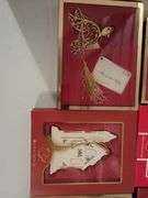 Collection of Lenox Christmas ornaments in the box