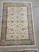 2 smaller area rugs