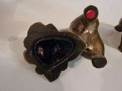 2 dog bookends, and 1 brass dog sculpture