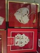Collection of Lenox Christmas ornaments in the box