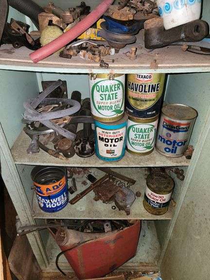 Contents of these shelves, Vintage unopened oil cans