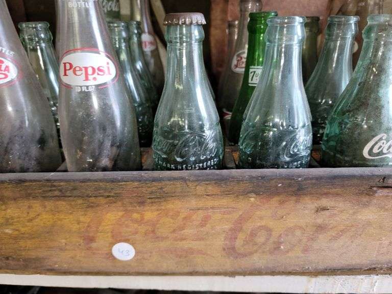 Old Coca Cola bottles from local jurisdictions, old phones and more