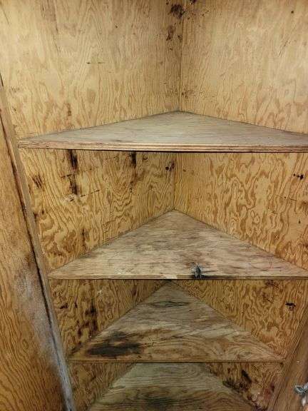 Solid wood corner cabinet.