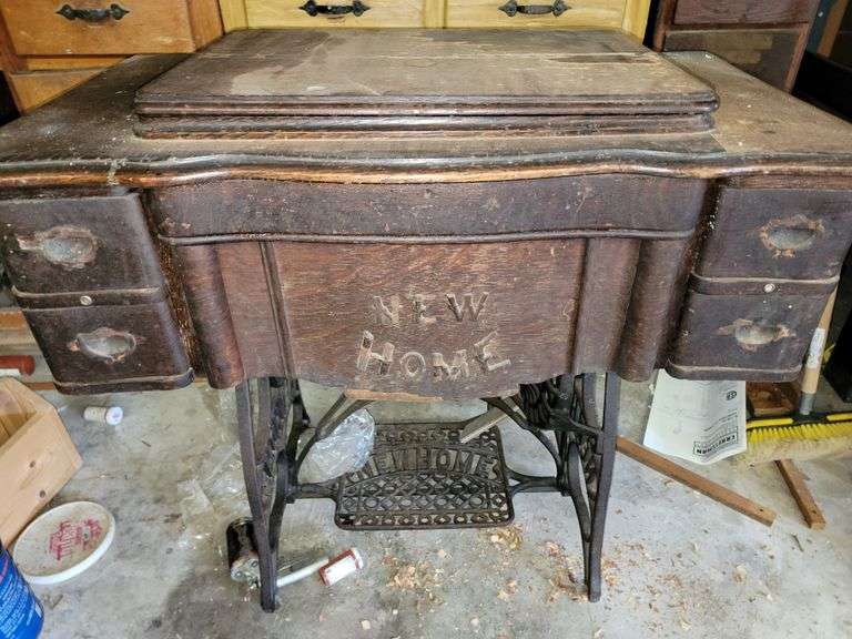 Antique New Home Sewing Machine and Cabinet