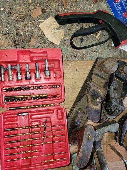 Bucket full of Planers, Drill Bits, Hammers, Crowbar and more
