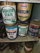 Contents of these shelves, Vintage unopened oil cans